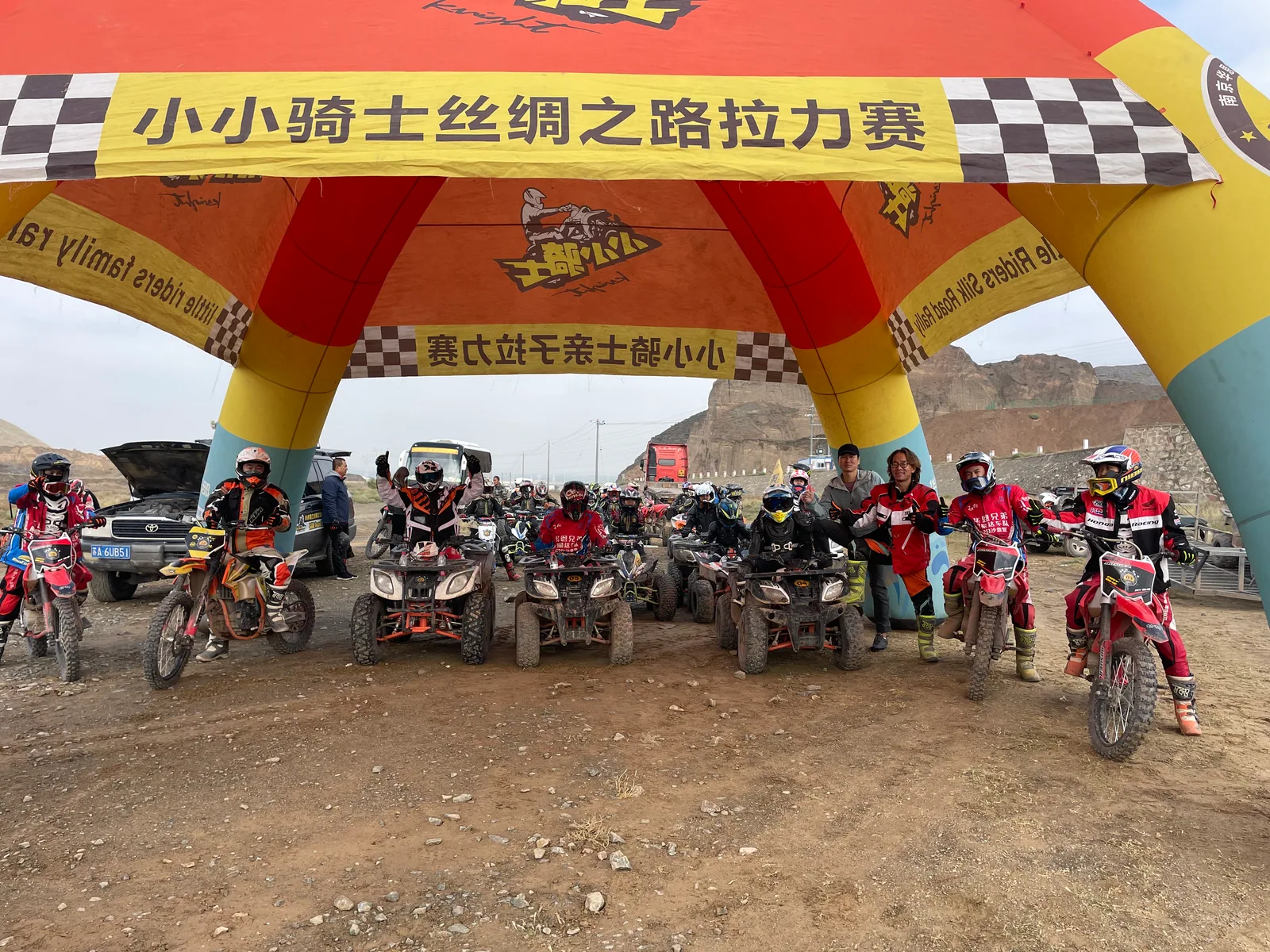 Kids Rally Camp riders assemble beneath the Silk Road Rally start arch